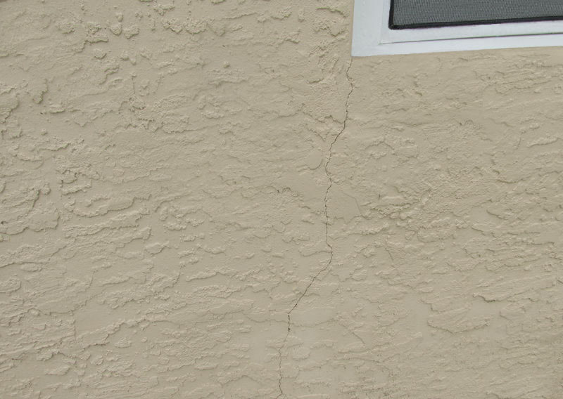 Hairline Crack at Corner of Window Hairline Crack at Corner of Window